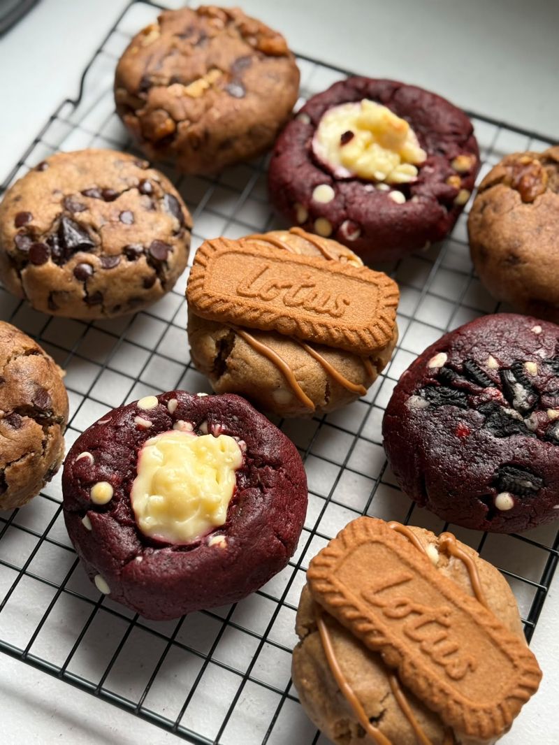 Fresh-baked cookies cooling on racks